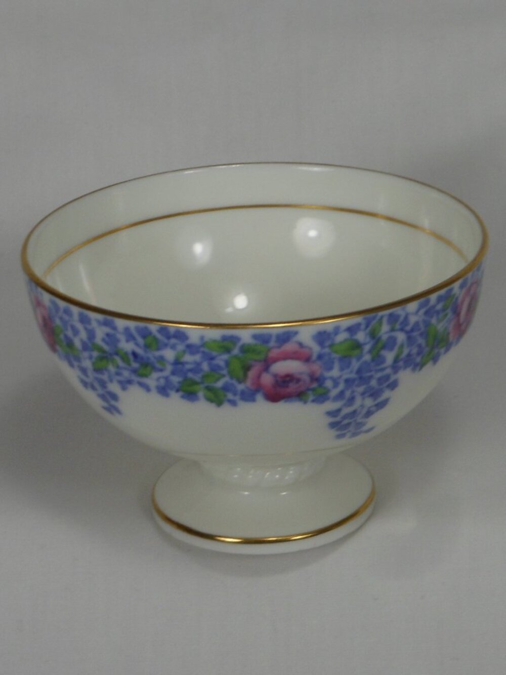 Cauldon UK bone china footed sugar bowl. Floral gold rim